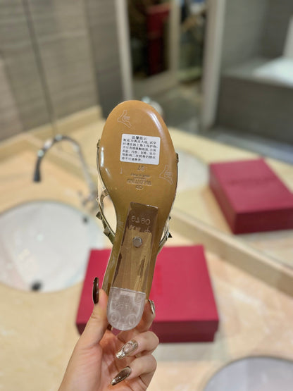 ROCKSTUD MULE SANDALS IN GOLD CALFSKIN AND TRANSPARENT PVC FILM