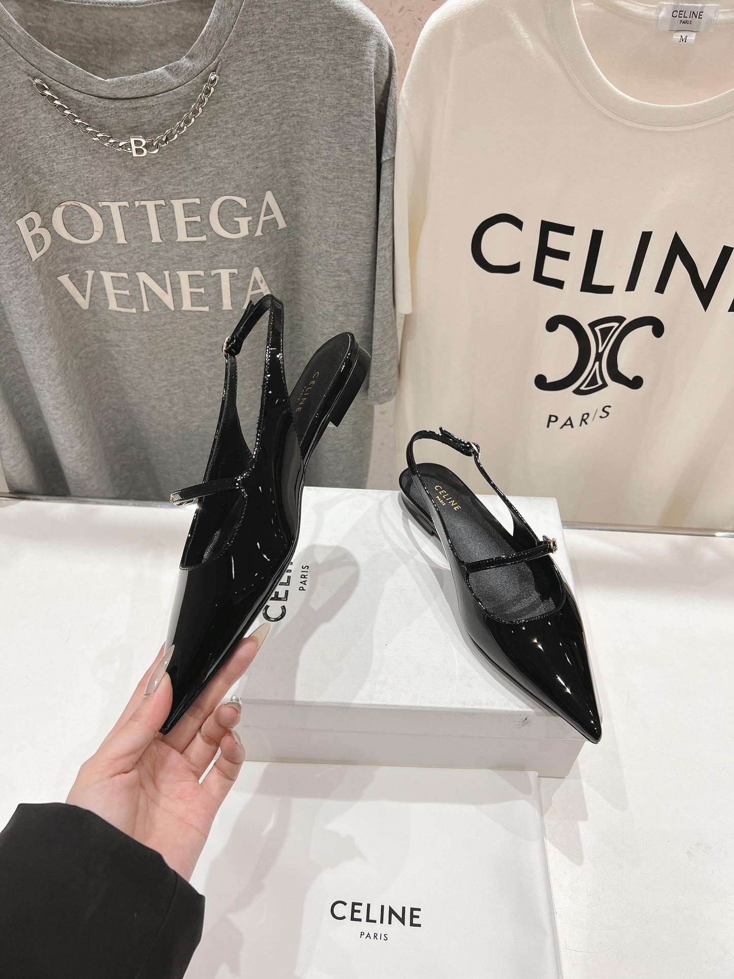 JUDY FLAT SLINGBACK IN BLACK PATENT CALFSKIN