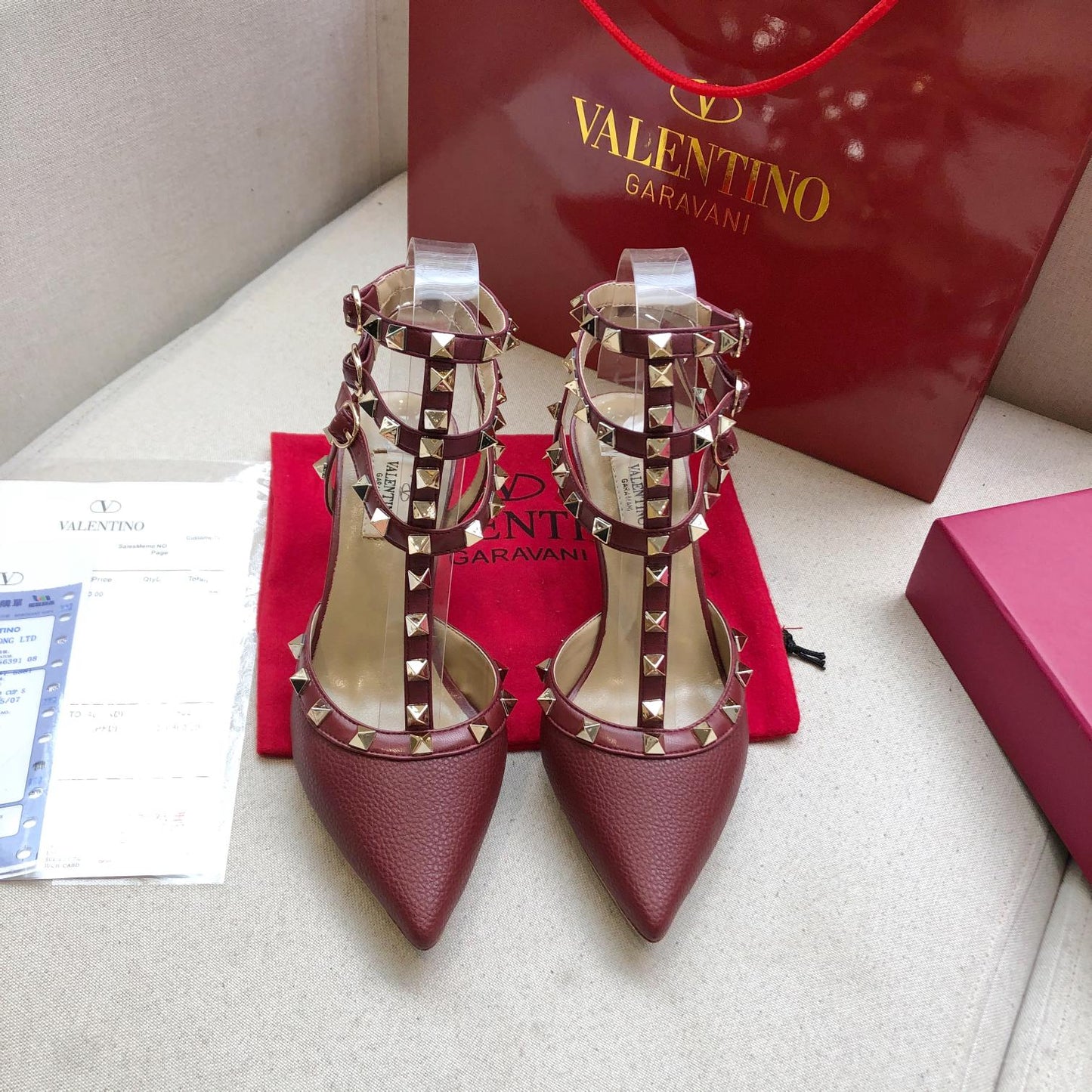 ROCKSTUD SANGRIA RED METALLIC CALFSKIN ANKLE STRAP HIGH SANDAL